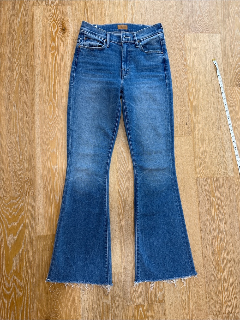 MOTHER Medium Blue Weekender Jeans with Raw Hem